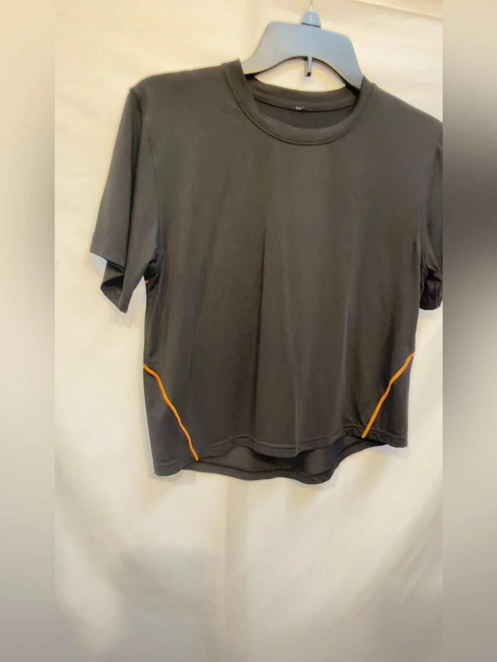 Lululemon Ventilated Open-Back Training T-Shirt in Black with Orange Soda trim